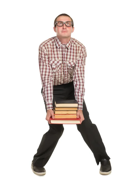 Nerd met bril en een boek in de hand — Stockfoto