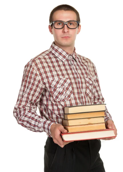 Nerd met bril en een boek in de hand — Stockfoto