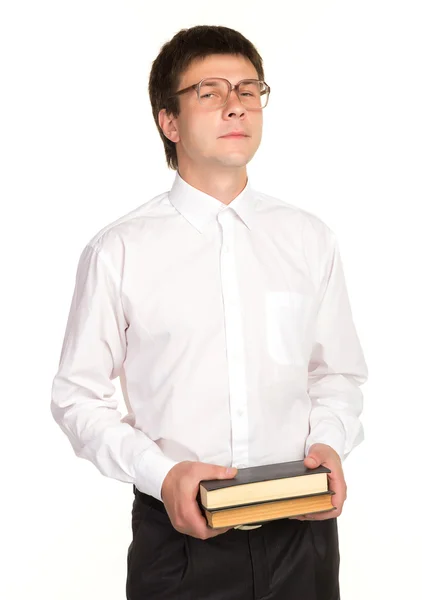 Nerd mit Brille und Buch in der Hand — Stockfoto