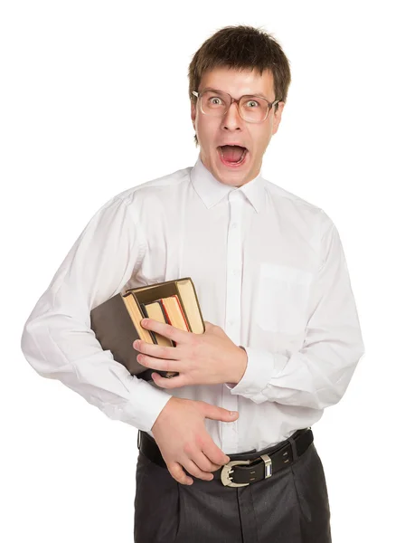 Nerd met bril en een boek in de hand — Stockfoto