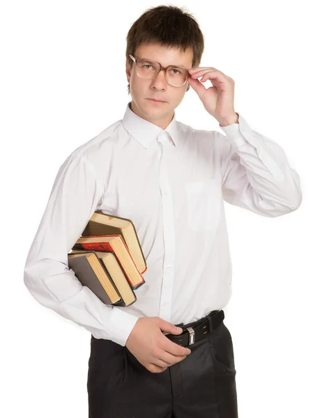 Nerd mit Brille und Buch in der Hand — Stockfoto