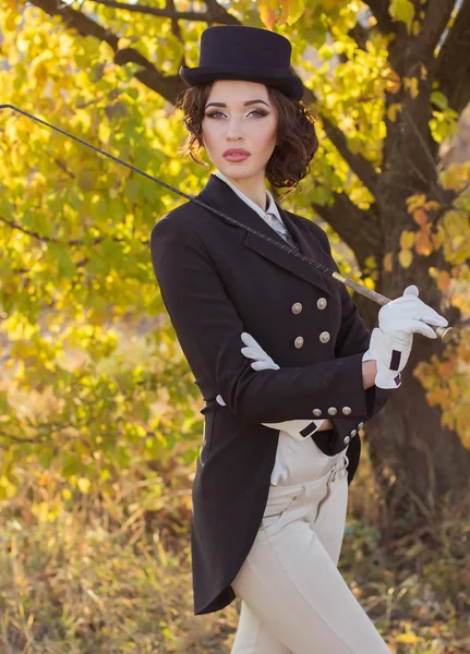 Beautiful girl jockey posing — Stock Photo, Image