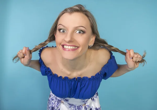 Funny girl with pigtails — Stock Photo, Image