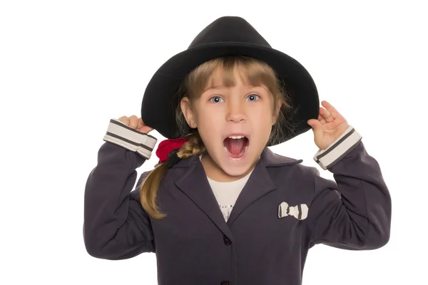 Niña sorprendida con chaqueta y sombrero — Foto de Stock