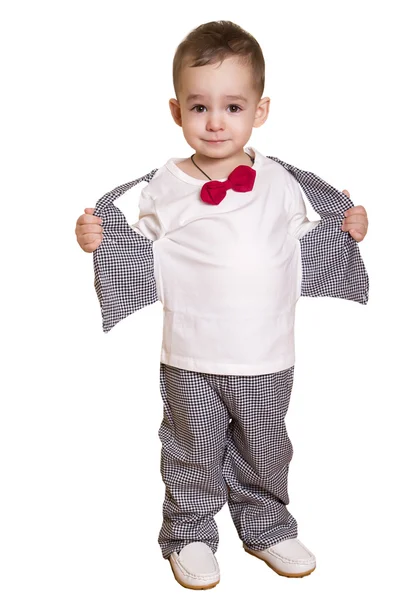 Niño pequeño con un traje a cuadros y pajarita —  Fotos de Stock