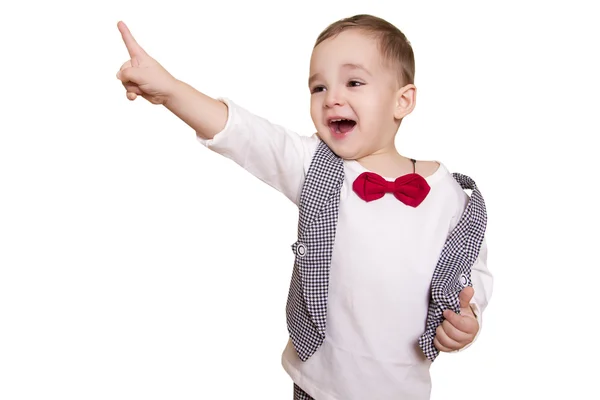 Niño pequeño con un traje a cuadros y pajarita muestra el pulgar hacia arriba — Foto de Stock