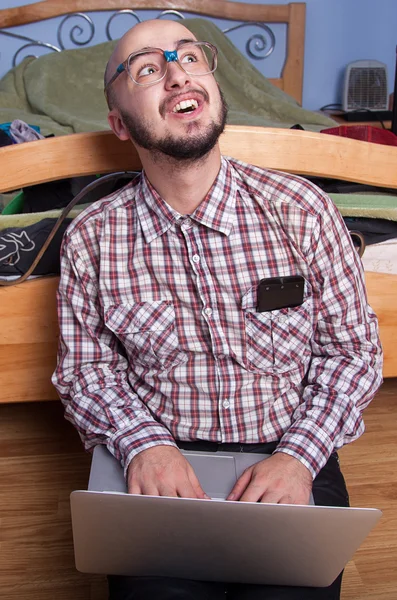 Funny nerd with a laptop — Stock Photo, Image