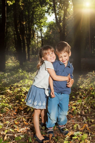 Little boy and girl hugging — Stock Photo, Image