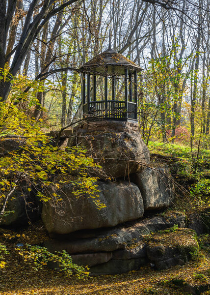 Alcove in the Sofievsky arboretum or Sofiyivsky Park in Uman, Ukraine, on a sunny autumn day