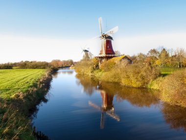 Greetsiel, traditional Dutch Windmill clipart