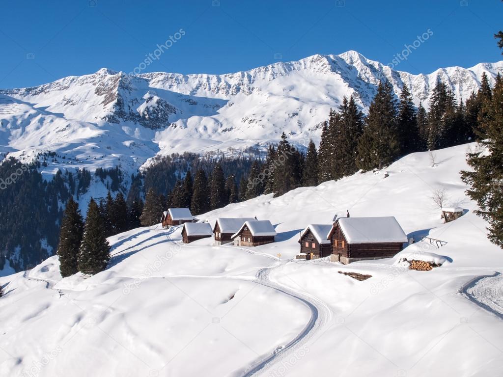Snowy mountain chalet in wood