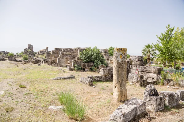 Pamukkale - Hierapolis, Turkey. The ruins of the ancient city buildings in the archaeological area — Stock Photo, Image