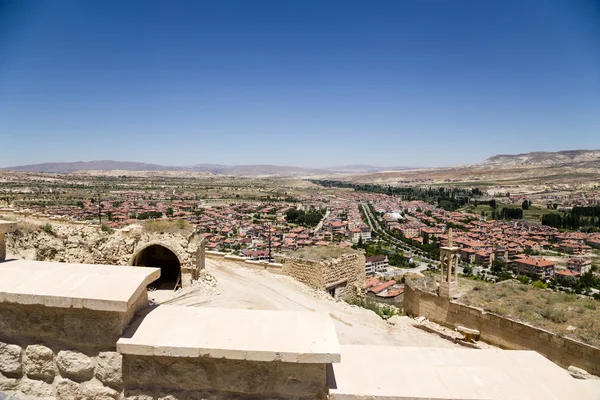 Urgup, Turkey. Ruins of the old town and the modern city — Stock Photo, Image