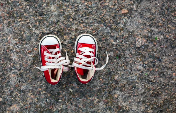 Baby sneakers with white shoelace — Stock Photo, Image