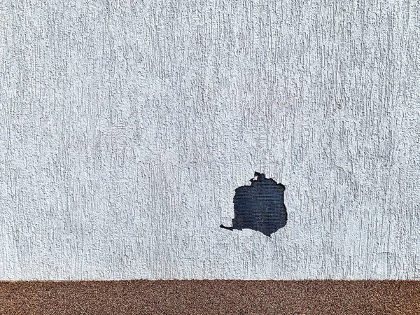 Textured white facade from plaster bark beetle stemroach with broken spot — Stock Image Textured White Facade Plaster Bark Beetle Stemroach Broken Spot Royalty Free Stock Photos