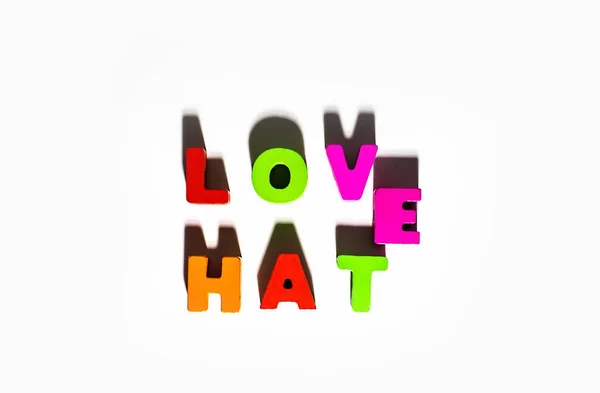 Love Hate Words Spelling Wooden Colorful Letters Common Shadows Isolated — Stock fotografie
