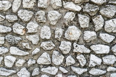 stone wall background closeup texture grey white old broken marble material rough pattern wallpaper backdrop