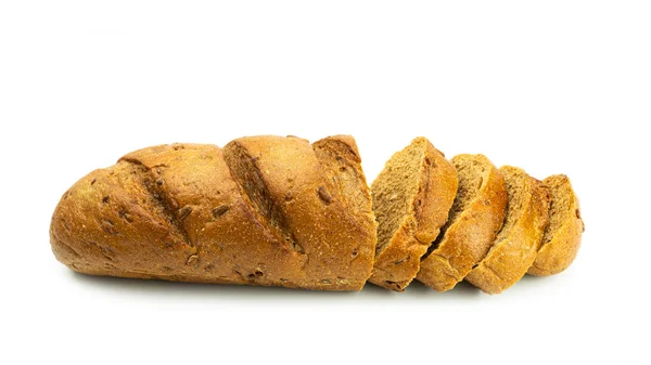 Sliced long loaf with cereals on a white background. — Stock Photo, Image