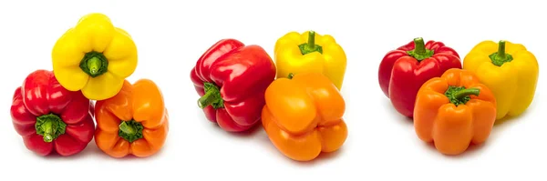 Bunte Paprika auf weißem Hintergrund. Rote, orangefarbene und gelbe Paprika. — Stockfoto