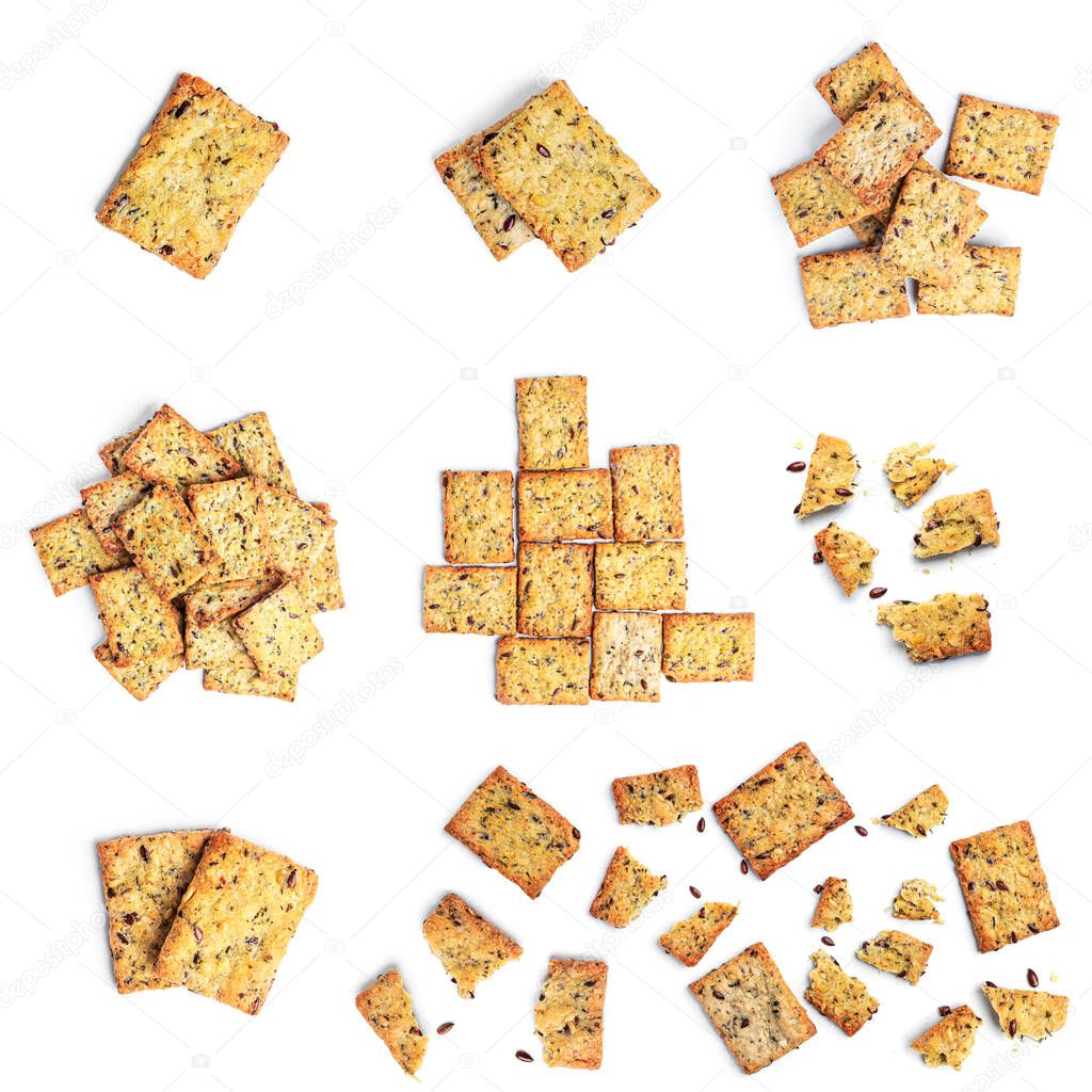 Italian crispbreads with celery, flax seeds and olive oil on a white background.