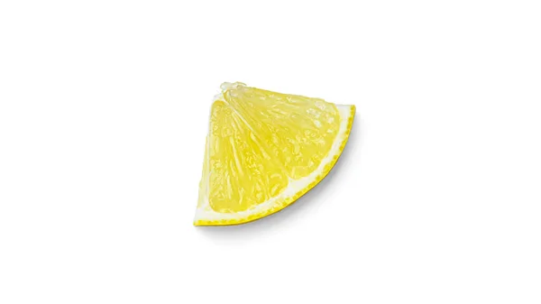 Tranche de citron sur fond blanc. — Photo