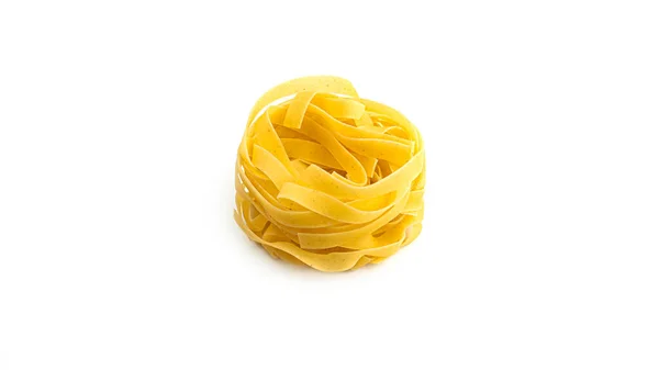 Uncooked Fettuccine Nest Pasta White Background High Quality Photo — Stock Photo, Image