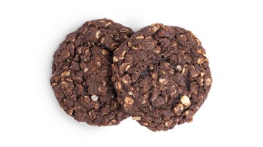 Beyaz arka planda üzümlü ve hindistan cevizli çikolatalı yulaflı kurabiyeler. Yukarıdan bak. Yüksek kalite fotoğraf