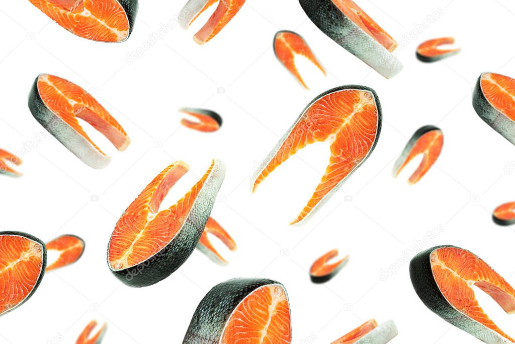 Raw salmon steak on white background. Flying salmon steaks. High quality photo