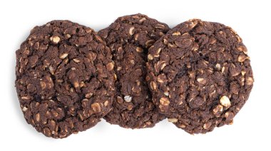 Beyaz arka planda üzümlü ve hindistan cevizli çikolatalı yulaflı kurabiyeler. Yukarıdan bak. Yüksek kalite fotoğraf