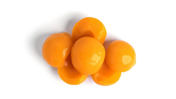 Persikor på burk isolerade. Söta persikor i sirap isolerad på vit bakgrund. — Stockfoto