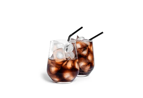 Soda with ice in a transparent glasses isolated on a white background. — Stock Photo, Image