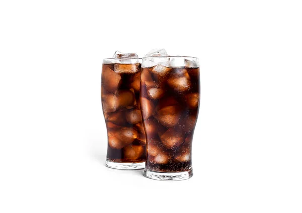 Soda with ice in a transparent glasses isolated on a white background. Stock Picture