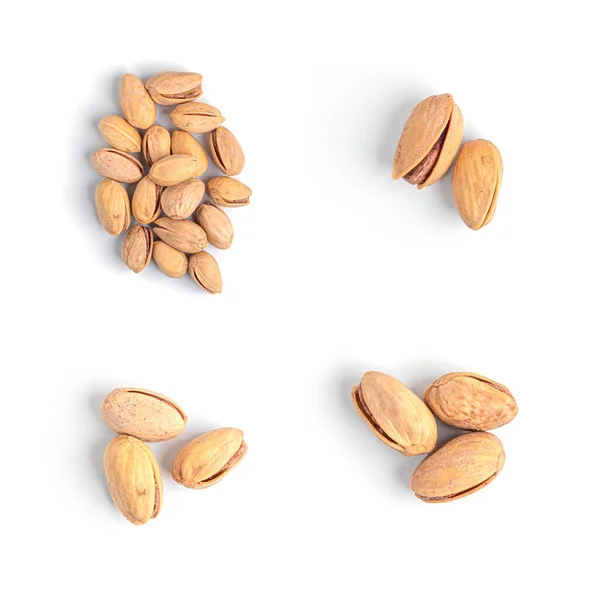 Pistachios on white background. Nuts collection isolated. — Stock Photo, Image