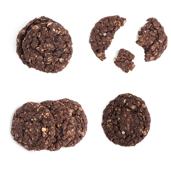 Chocolate oatmeal cookies with raisins and coconut on a white background. View from the top. — Stock Photo, Image