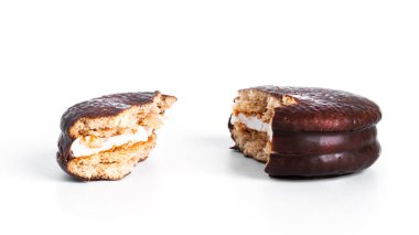 Chocolate dessert chocopie isolated on white background. Chocolate sponge cake. Chocolate cookies.