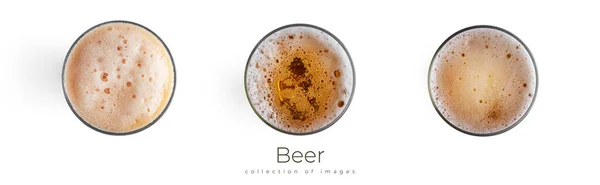 Copos de cerveja leve isolados sobre fundo branco. Vista de cima. — Fotografia de Stock