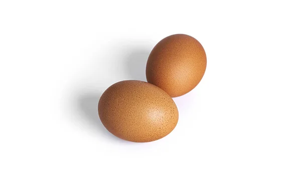 Vejce jsou izolována na bílém pozadí. Hnědá vejce. — Stock fotografie