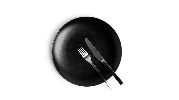 Gebarentaal met bestek. Een bord met bestek geïsoleerd op een witte achtergrond. Bord, mes, vork op een witte achtergrond. — Stockfoto
