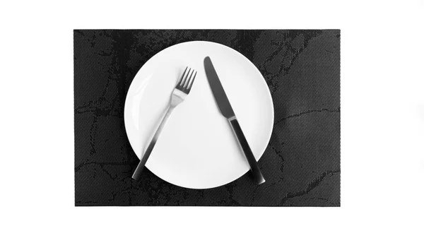 Sign language with cutlery. A plate with cutlery isolated on a white background. Plate, knife, fork on a white background. — Stock Photo, Image