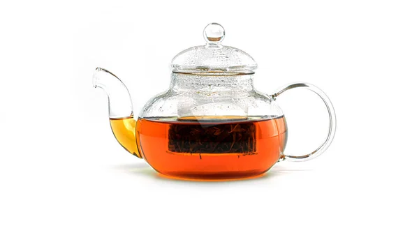 Tetera transparente con té sobre fondo blanco. — Foto de Stock
