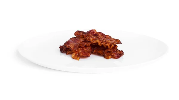 Tocino frito aislado sobre fondo blanco . — Foto de Stock