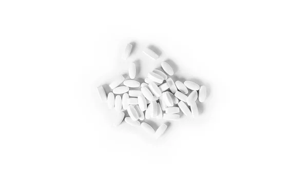 White pills isolated on a white background. — Stock Photo, Image