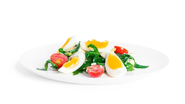 Sałatka rukoli, awokado, pomidory wiśniowe i jaja wyizolowane na białym tle. Zielony salat. Sałatka wegetariańska. — Zdjęcie stockowe