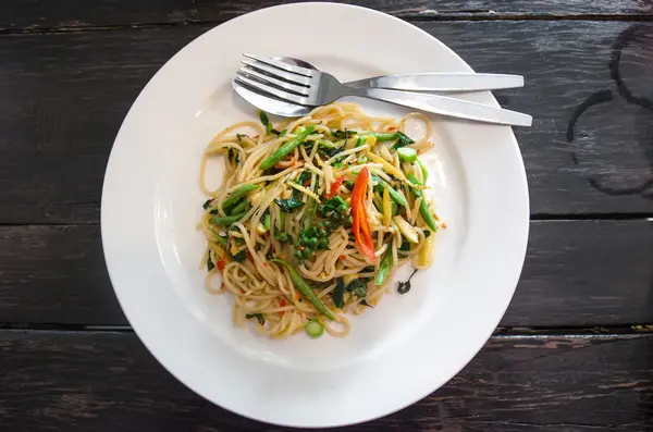 Thai style stir-fried spicy spaghetti — Stock Photo, Image