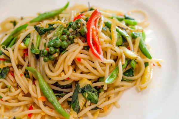 Thai style stir-fried spicy spaghetti — Stock Photo, Image