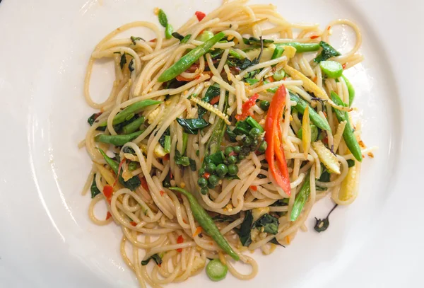 Thai style stir-fried spicy spaghetti — Stock Photo, Image