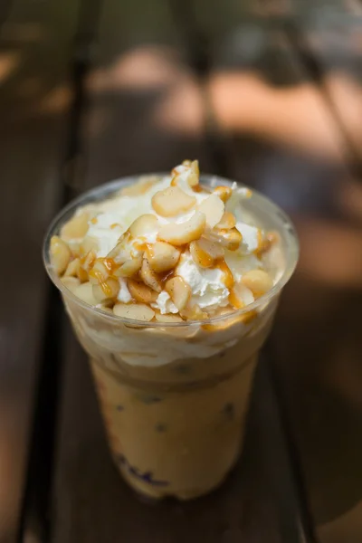 Ice coffee with macadamia nuts — Stock Photo, Image