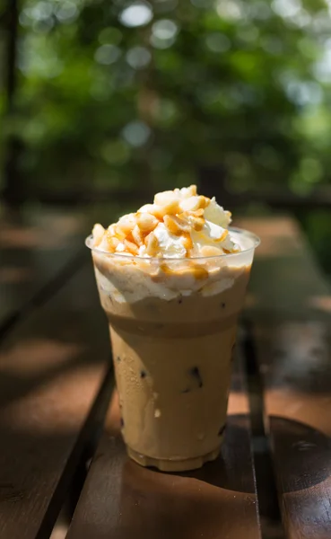 Ice coffee with macadamia nuts — Stock Photo, Image