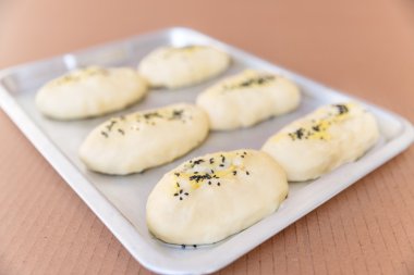 bir ekmek buns satırları