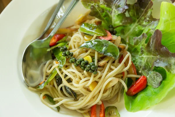 Spaghetti noodles on white plate — Stock Photo, Image